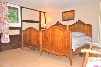 Un ou plusieurs lits dans un hébergement de l'établissement CHEZ CECILE Bed and Breakfast chez le VIGNERON
