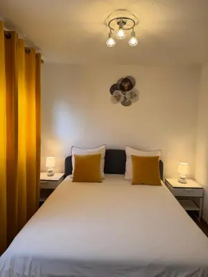 Un ou plusieurs lits dans un hébergement de l'établissement Sion City Mulhouse centre - parking et balcon-wifi 5G gratuit