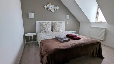 Un ou plusieurs lits dans un hébergement de l'établissement Pro & Loisirs, 2 Chambres, Clim, WiFi