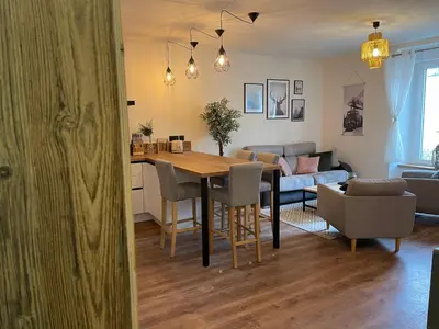 Coin salon dans l'établissement Appartement tout confort haut de gamme en plein centre ville