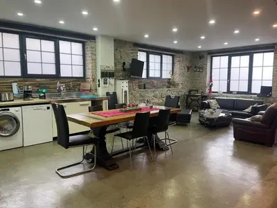Coin salon dans l'établissement Le Loft de l ancienne forge