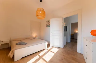 Un ou plusieurs lits dans un hébergement de l'établissement Colmar Terrace - BELLE ALSACE 4 - BookingAlsace