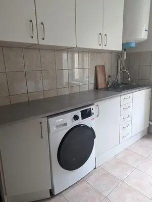 Cuisine ou kitchenette dans l'établissement Le Thannois - appartement 2 chambres, salon, cuisine équipée, parking et wifi gratuit