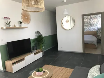 Un ou plusieurs lits dans un hébergement de l'établissement Appartement au cœur du Val d'Argent