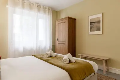 Un ou plusieurs lits dans un hébergement de l'établissement Travel Homes - Le Freedom, chaleureux & spacieux