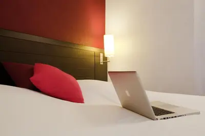 Un ou plusieurs lits dans un hébergement de l'établissement ibis Styles Belfort Centre