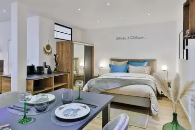 Un ou plusieurs lits dans un hébergement de l'établissement Studio des 3 Châteaux