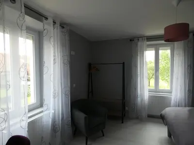 Un ou plusieurs lits dans un hébergement de l'établissement Les Chambres d Odile