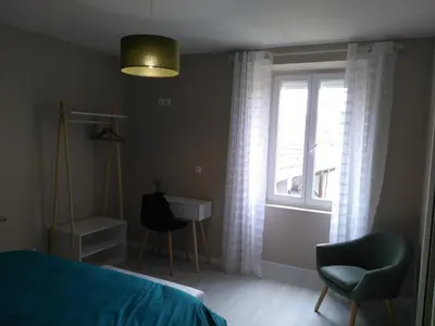 Un ou plusieurs lits dans un hébergement de l'établissement Les Chambres d Odile