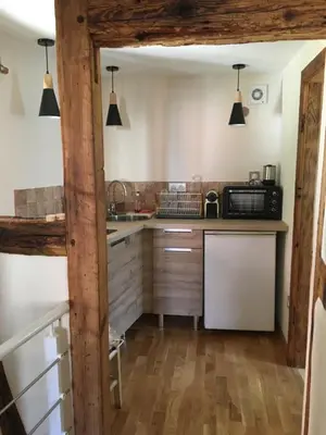Cuisine ou kitchenette dans l'établissement Le Petit Cocon