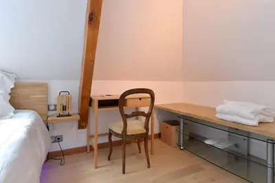 Un ou plusieurs lits dans un hébergement de l'établissement Chambres Vignes et Châteaux