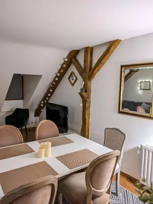 Coin salon dans l'établissement Les Toits de Turckheim