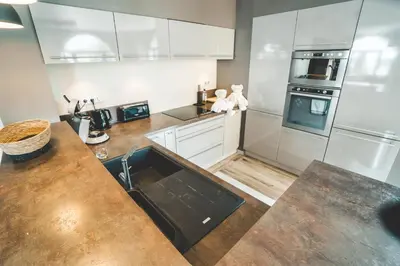Cuisine ou kitchenette dans l'établissement le coup de soleil
