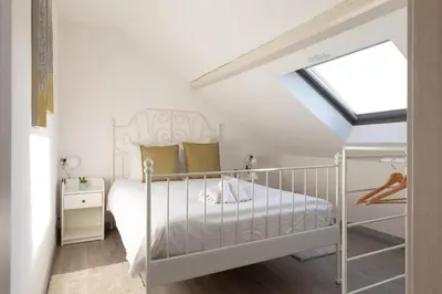 Un ou plusieurs lits dans un hébergement de l'établissement Hearten - Mulhouse bnb