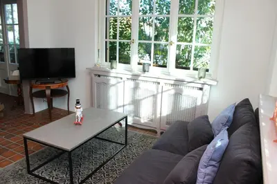 Télévision ou salle de divertissement dans l'établissement Villa Schmitt