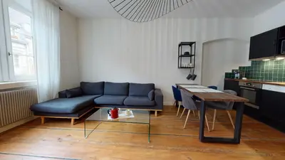 Coin salon dans l'établissement Le Neubau
