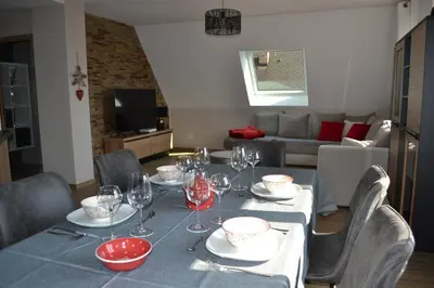Coin salon dans l'établissement Gîte Les terrasses du Mambourg à Kaysersberg-Vignoble