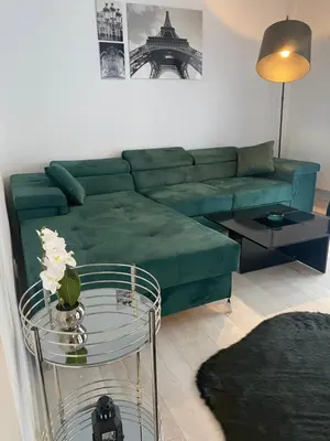 Coin salon dans l'établissement Le Grand DOLLFUS, 90m2 de charme au coeur de ville