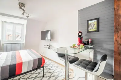 Un ou plusieurs lits dans un hébergement de l'établissement StuDio 11 - Centre-ville - Cozy