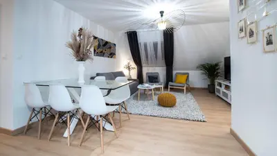 Coin salon dans l'établissement Superbe appartement au coeur du Colmar