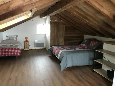 Un ou plusieurs lits dans un hébergement de l'établissement Le Duplex