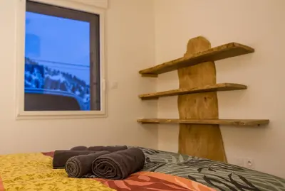 Un ou plusieurs lits dans un hébergement de l'établissement Chalet de standing 9P avec sauna & salle d'escalade