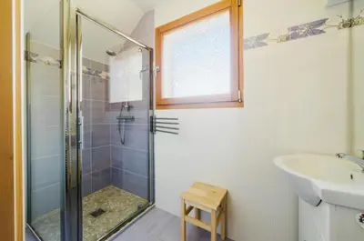 Salle de bains dans l'établissement Le Refuge du Cerf