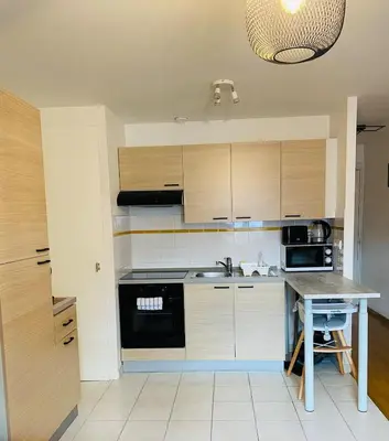 Cuisine ou kitchenette dans l'établissement Au pied de la Cathédrale