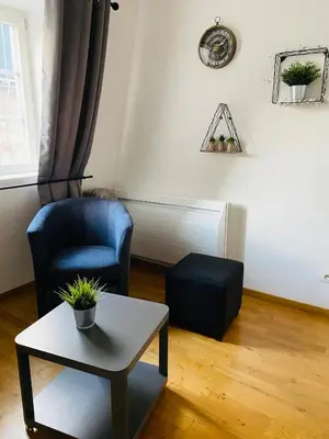 Coin salon dans l'établissement Au pied de la Cathédrale