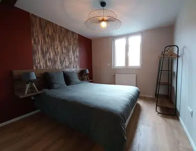 Un ou plusieurs lits dans un hébergement de l'établissement L'ALSACIEN Centre Ville 2 chambres et Terrasse