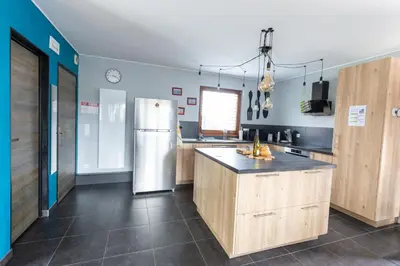 Cuisine ou kitchenette dans l'établissement Agréable maison à la campagne