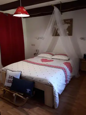 Un ou plusieurs lits dans un hébergement de l'établissement La Grande Ferme