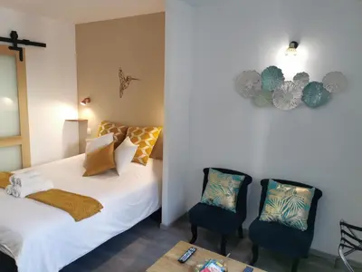 Un ou plusieurs lits dans un hébergement de l'établissement Studio Cosy Bronze - Cosy & Cocon