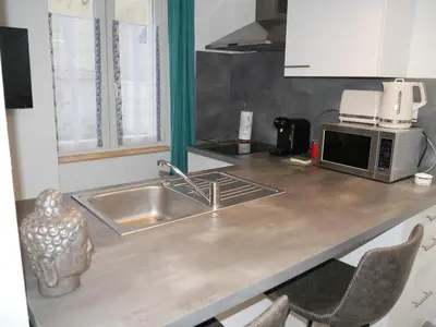 Cuisine ou kitchenette dans l'établissement Studio Cosy Bronze - Cosy & Cocon
