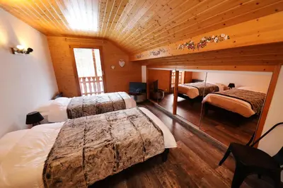 Un ou plusieurs lits dans un hébergement de l'établissement CHALET 6 PERS INDEPENDANT PROCHE CENTRE ET LAC