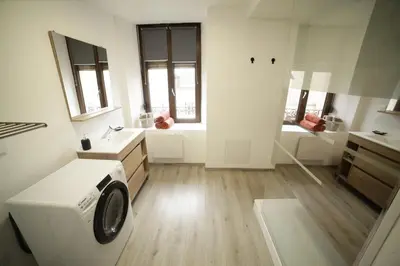 Un ou plusieurs lits dans un hébergement de l'établissement LE FERRETTE - Appartement moderne et confortable