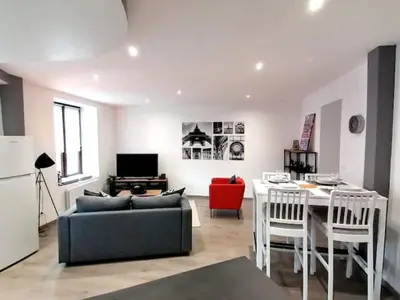 Coin salon dans l'établissement LE FERRETTE - Appartement moderne et confortable