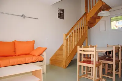 Coin salon dans l'établissement Le Herbau