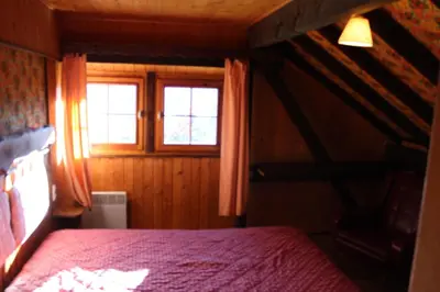 Un ou plusieurs lits dans un hébergement de l'établissement appartement mitoyen dans chalet