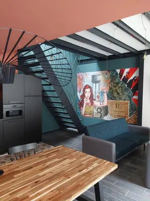 Cuisine ou kitchenette dans l'établissement Au Paradis du Loft Joyeux