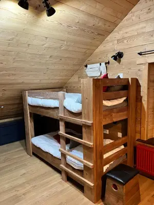 Un ou plusieurs lits dans un hébergement de l'établissement Gîte 5* piscine intérieure, sauna, à 20 mins des pistes de ski, à 300 m d’un Lac