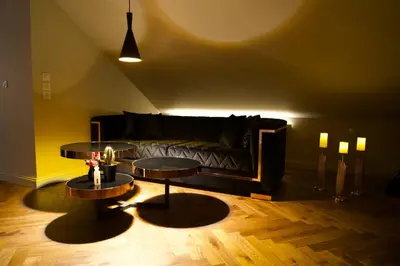 Coin salon dans l'établissement Magnifique Villa le89golden jacuzzi et sauna privatif