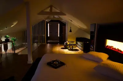 Un ou plusieurs lits dans un hébergement de l'établissement Magnifique Villa le89golden jacuzzi et sauna privatif