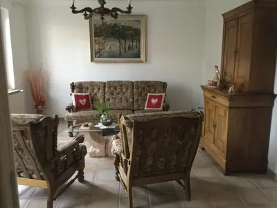 Coin salon dans l'établissement Gîte du Moulin