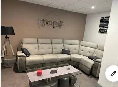 Coin salon dans l'établissement Appartement saisonnier