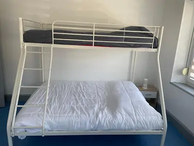 Un ou plusieurs lits dans un hébergement de l'établissement Appartement saisonnier