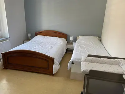 Un ou plusieurs lits dans un hébergement de l'établissement Appartement saisonnier