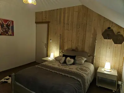 Un ou plusieurs lits dans un hébergement de l'établissement Gite Eglantine 2 à 6 personnes avec SPA et salle de jeux dans la résidence