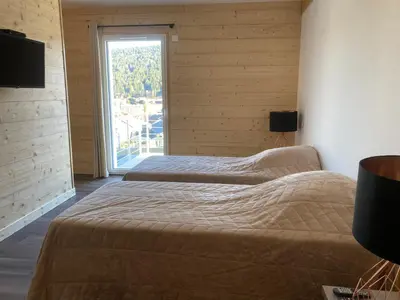 Un ou plusieurs lits dans un hébergement de l'établissement Chalet Jersey