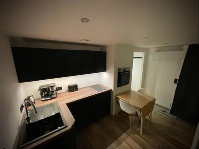 Cuisine ou kitchenette dans l'établissement Le gîte cozy de Bouvacôte avec vue panoramique et Sauna